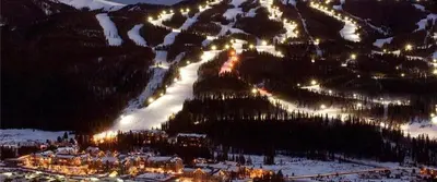a snowy mountain with lights on a ski resort at night at Keystone W Magical View Walk to Ski Lift in Keystone