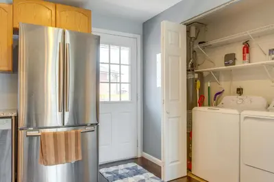 a kitchen with a stainless steel refrigerator at 12 Mi to Denver Golden Vacation Rental! in Golden