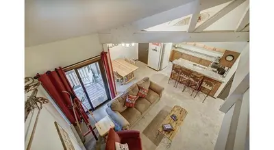 an overhead view of a living room and dining room at Updated 2Br Plus Loft Condo on Shuttle Route! Sleeps 8 & Kids Ski Free condo in Montezuma