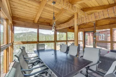 a dining room with a table and chairs at Mountain-View Front Range Colorado Vacation Rental in Red Feather Lakes