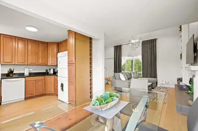 a kitchen and a living room with a table at Stunning 3BR central to Breck Keystone Copper in Silverthorne