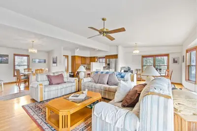 a living room with two couches and a table at Homey 3BR Near Lake Dillon with Mountain Views in Dillon