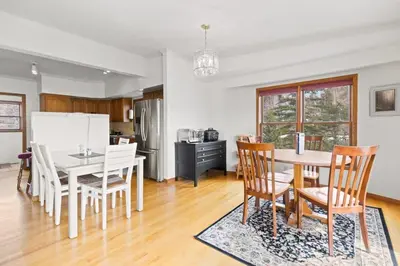a kitchen and dining room with a table and chairs at Homey 3BR Near Lake Dillon with Mountain Views in Dillon