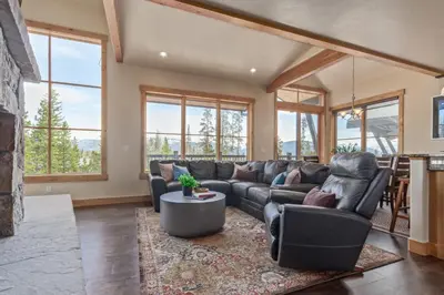 a living room with a couch and a table at Incredible 3BR Tranquil Setting & Space to Spare in Silverthorne