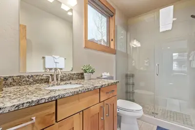 a bathroom with a sink and a toilet and a shower at Incredible 3BR Tranquil Setting & Space to Spare in Silverthorne