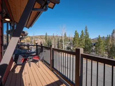 a balcony of a house with a table and chairs at Incredible 3BR Tranquil Setting & Space to Spare in Silverthorne