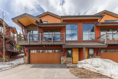 a large house with a balcony on top of it at Incredible 3BR Tranquil Setting & Space to Spare in Silverthorne