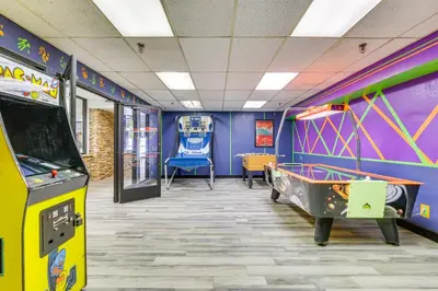 a play room with a pool table and a video game at Convenient Winter Park, Colorado, Vacation Rental! in Winter Park