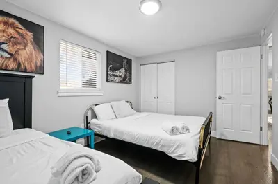 a bedroom with two beds and a window at Golfers Dream! Sweet NW location. in Arvada