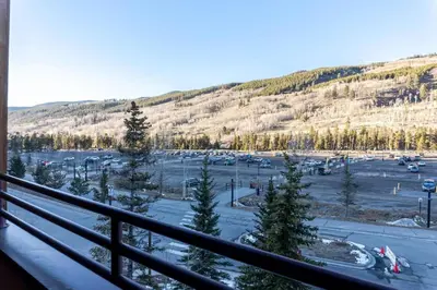 a view from a balcony of a parking lot at 2BR Ski In Ski Out Keystone Condo Walk to Slopes in Dillon