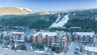 an aerial view of a resort with snow covered buildings at 2BR Ski In Ski Out Keystone Condo Walk to Slopes in Dillon