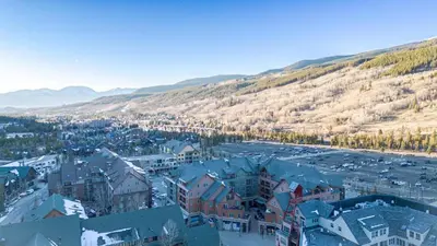 an aerial view of a town with a mountain at 2BR Ski In Ski Out Keystone Condo Walk to Slopes in Dillon