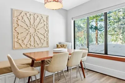 a dining room with a table and chairs and a window at 2BR Keystone Condo Near Slopes in Keystone