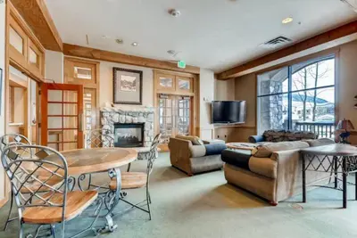 a living room filled with furniture and a fireplace at Buffalo Lodge 1 Bedroom Condo In River Run Village in Keystone