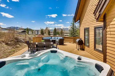 a hot tub on the deck of a house at 8 Mi to Keystone Home with Hot Tub in Dillon in Dillon