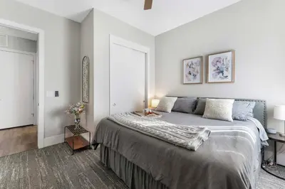 a bedroom with a large bed and a window at 1 Mi to Dtwn Cozy Retreat in Golden, CO! in Golden