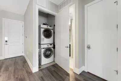 a laundry room with a washer and dryer at 1 Mi to Dtwn Cozy Retreat in Golden, CO! in Golden