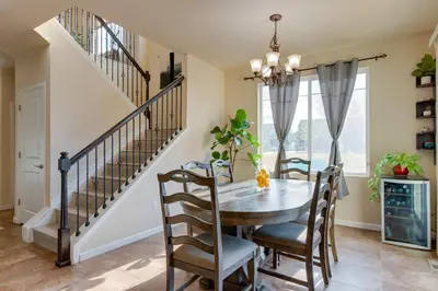 a dining room with a table and chairs at Westminster Home with Patio and BBQ Near Dtwn Denver in Westminster