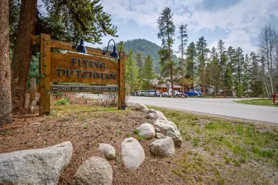 a sign for a flying dutchman on the side of a road at Ski Retreat Keystone Resort Condo with Heated Pool! in Keystone