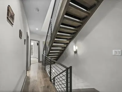 a spiral staircase in a white room with white walls at 58B 2Br 2,5Ba townhouse in Silverthorne