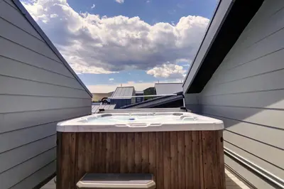 a hot tub on the roof of a house at 58B 2Br 2,5Ba townhouse in Silverthorne