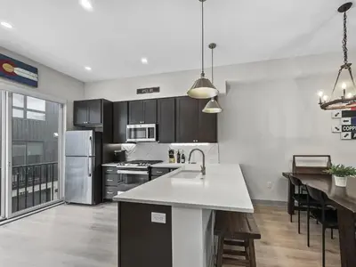 a kitchen with a sink and a counter top at 58B 2Br 2,5Ba townhouse in Silverthorne