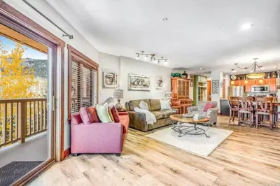 a living room with a couch and a table at River Run Village 2 Bedroom At Red Hawk in Dillon