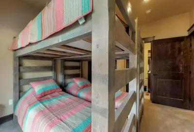a bedroom with two bunk beds in a room at River Run Townhomes - 3 Bedroom - Walk To Slopes! in Keystone