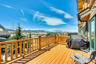 a wooden deck with a view of the mountains at Fraser Vacation Rental 6 Mi to Ski Resort in Fraser