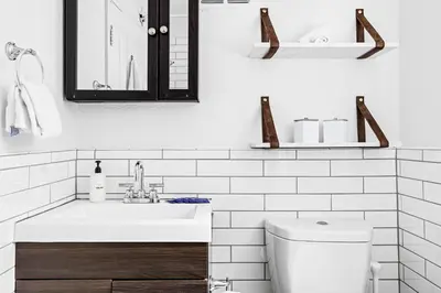 a white bathroom with a sink and a toilet at New Stylish Sanctuary - King Beds - Sloans Lake in Denver