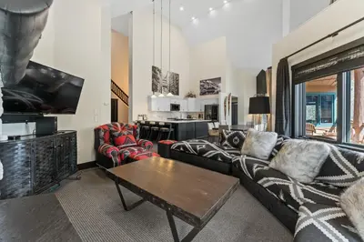 a living room with a couch and a table at Arap Ldg 8130 in Keystone