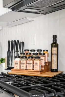 a shelf with a bottle of wine on a stove at Hot Tub MTN Views - Free Shuttle - Central WP in Winter Park