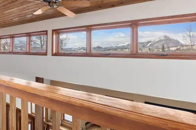 a balcony with a view of a mountain at 5BR Mountain Retreat with Hot Tub and Sauna in Silverthorne