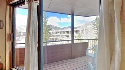 a balcony with a view of a building at 135 Marina Place in Dillon