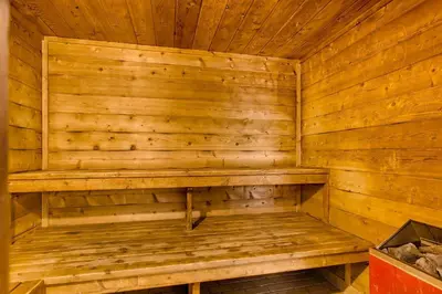 a wooden sauna with a bench in a cabin at 135 Marina Place in Dillon