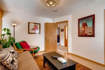 a living room with a couch and a table at 2028 Ryan Gulch in Silverthorne