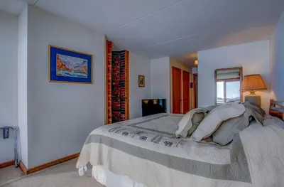 a bedroom with a large bed in a room at 207 Point Dillon in Dillon