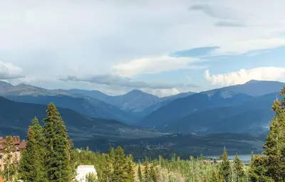 a view of a mountain with trees and mountains at 205-F Buffalo Ridge in Silverthorne