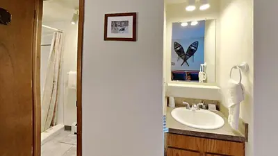 a bathroom with a sink and a mirror at 205-F Buffalo Ridge in Silverthorne