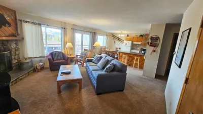a living room with a couch and a table at 205-F Buffalo Ridge in Silverthorne