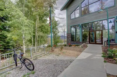a bike parked in front of a building at A203 Treehouse in Silverthorne