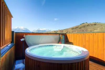 a hot tub on the deck of a house at 597 Deerpath in Dillon