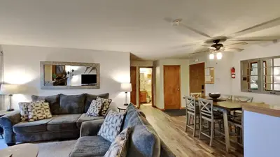 a living room with a couch and a table at AA302 Buffalo Village in Silverthorne