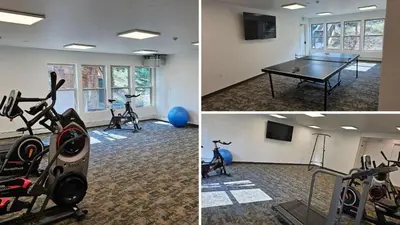 a gym with exercise bikes and a ping pong table at CC102 Buffalo Village in Silverthorne