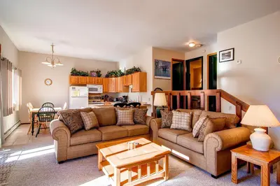 a living room with two couches and a table at B-101 Buffalo Ridge in Silverthorne