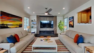 a living room with a couch and a fireplace at 33 Corinthian Circle in Dillon