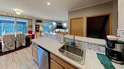 a kitchen with a sink and a counter top at Miners Run 79 in Silverthorne