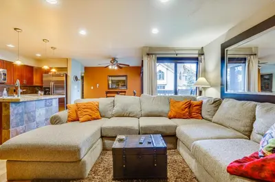 a living room with a couch and a kitchen at Dillon Vacation Rental 1 Mi to Keystone Resort in Dillon