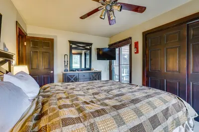 a bedroom with a bed and a ceiling fan at Dillon Vacation Rental 1 Mi to Keystone Resort in Dillon