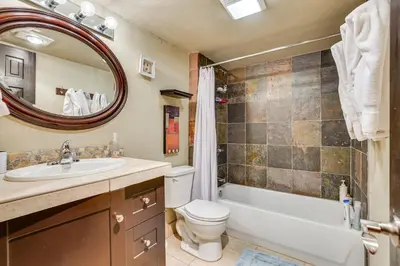 a bathroom with a sink toilet and a mirror at Dillon Vacation Rental 1 Mi to Keystone Resort in Dillon